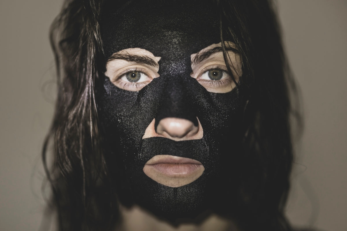 woman with black hair and black eye shadow