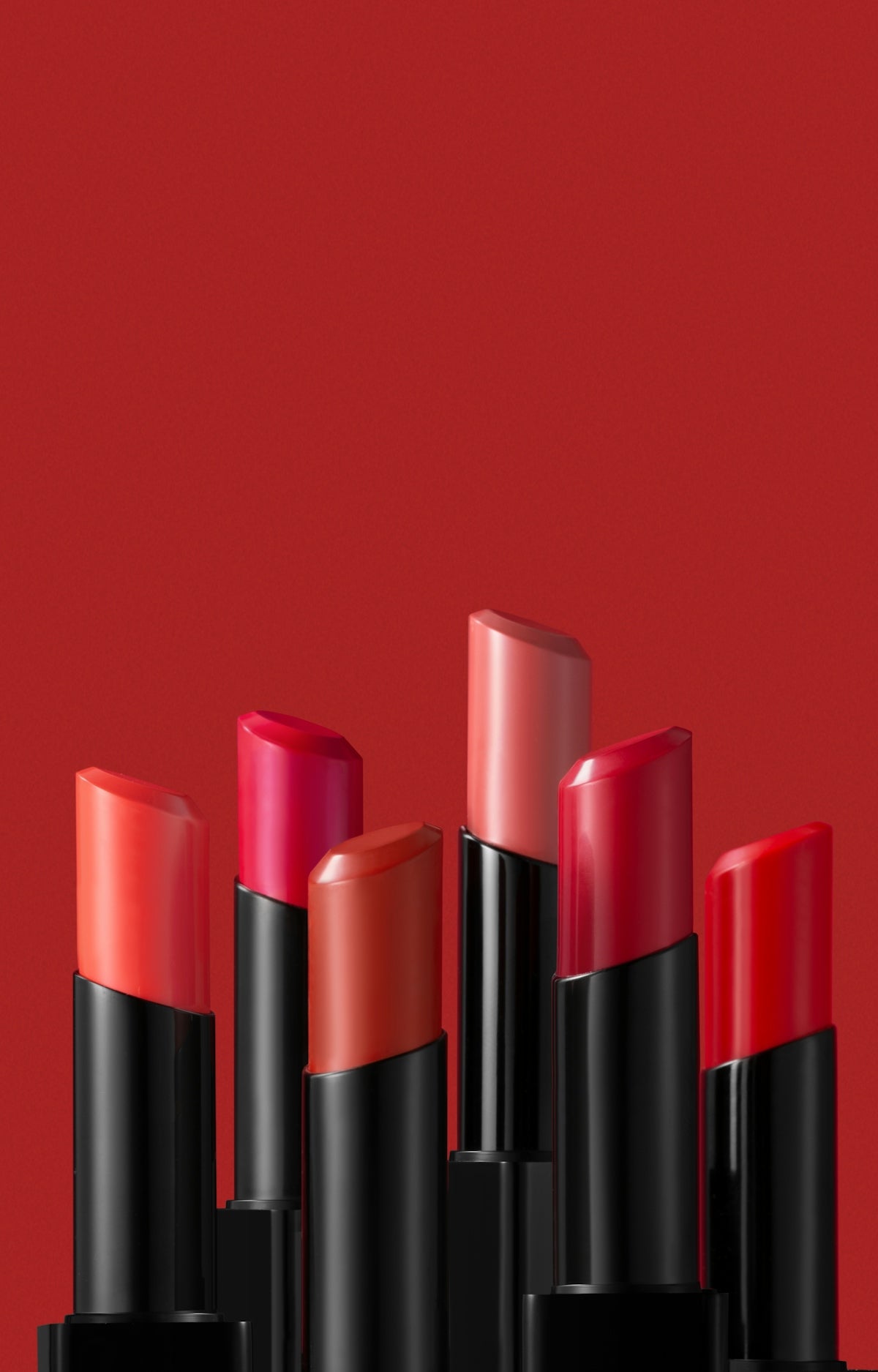 a group of lipsticks sitting next to each other