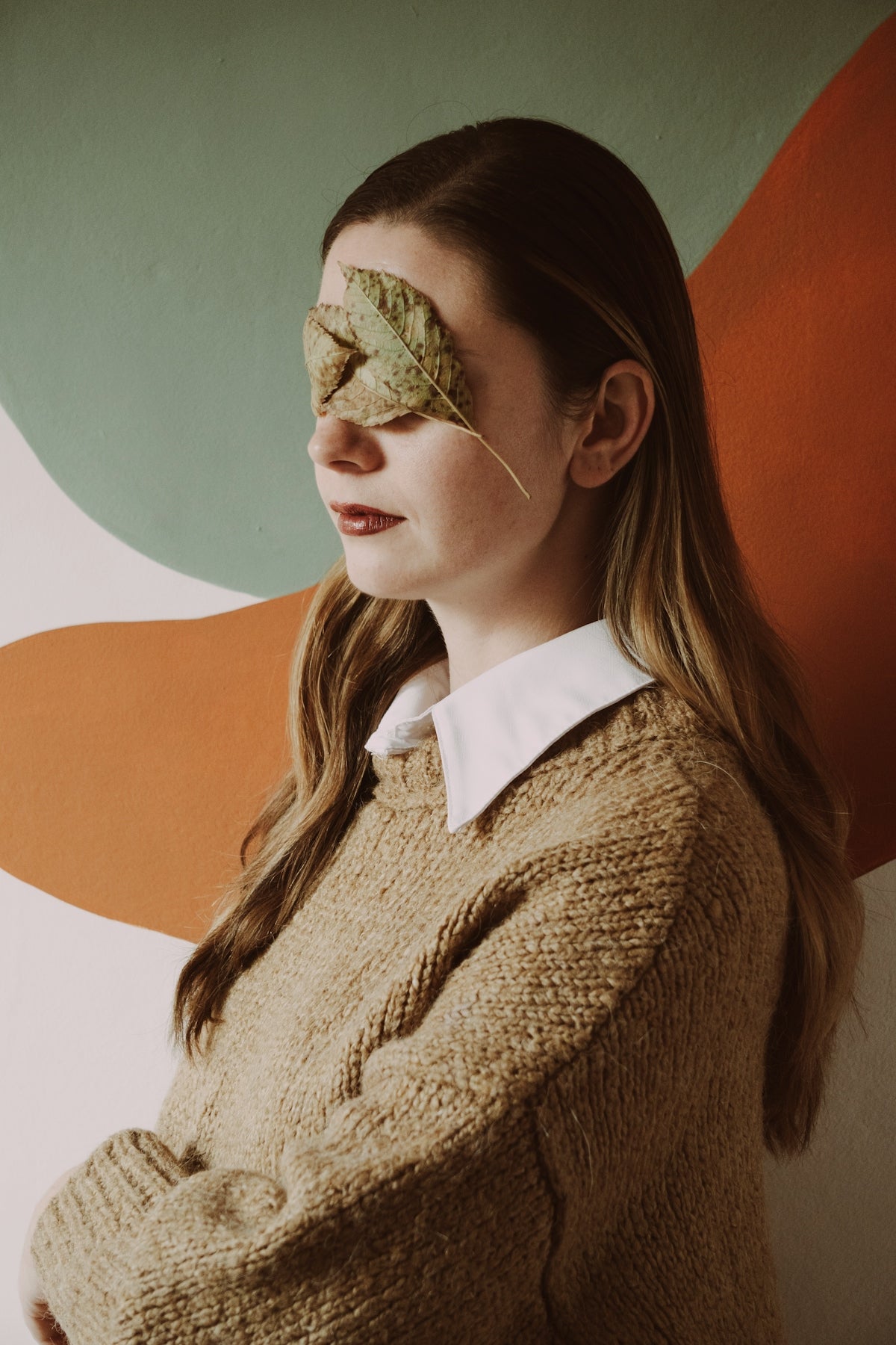 a woman with a mask on her face