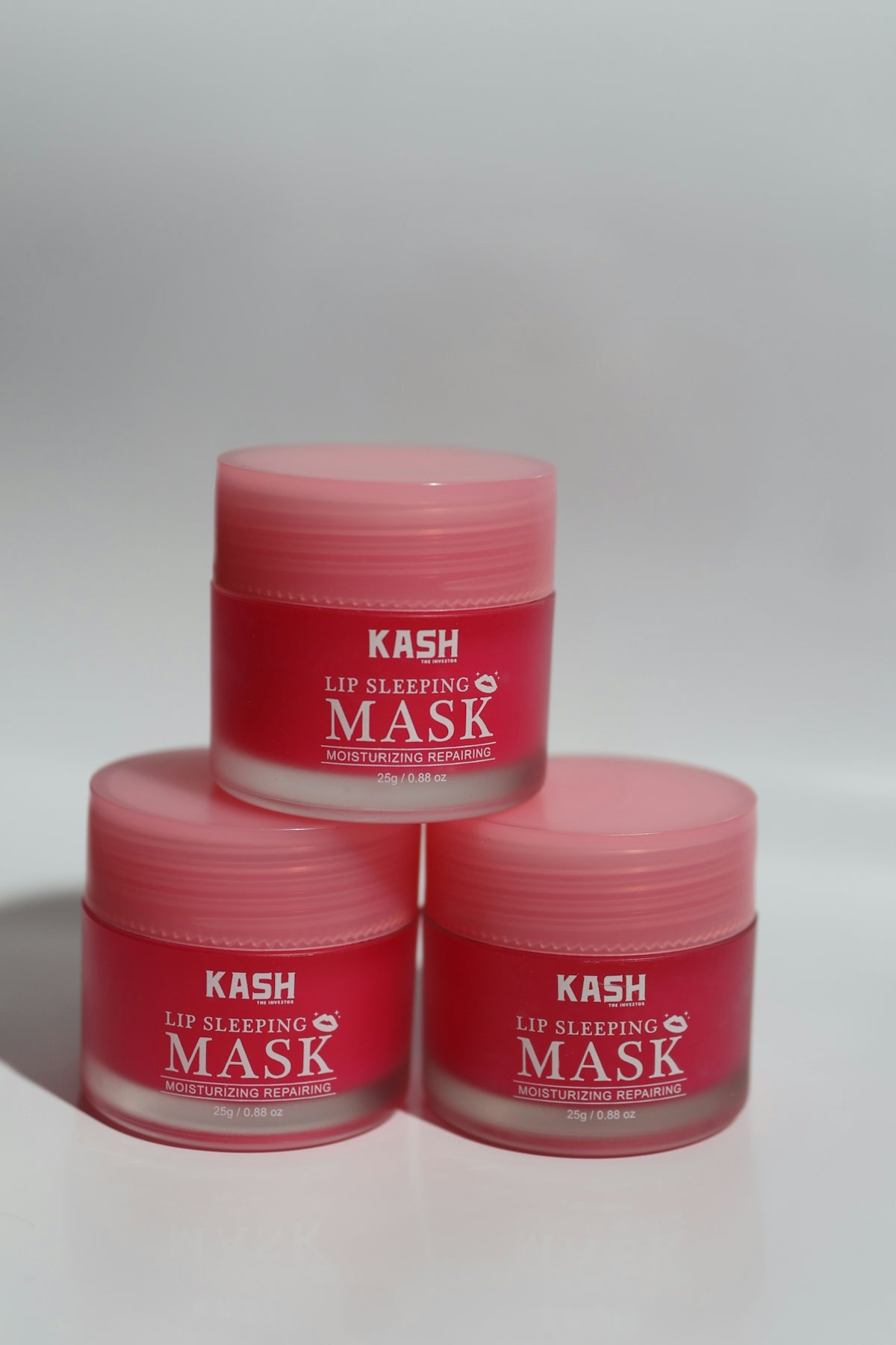 Three jars of mask on a white surface