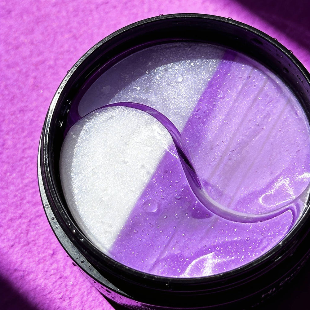 Open jar of purple and white Collagen Boost hydrogel eye masks