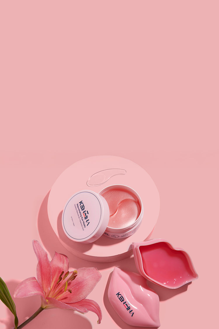 Pink jar of Kenzina eye masks with a flower on a pink background