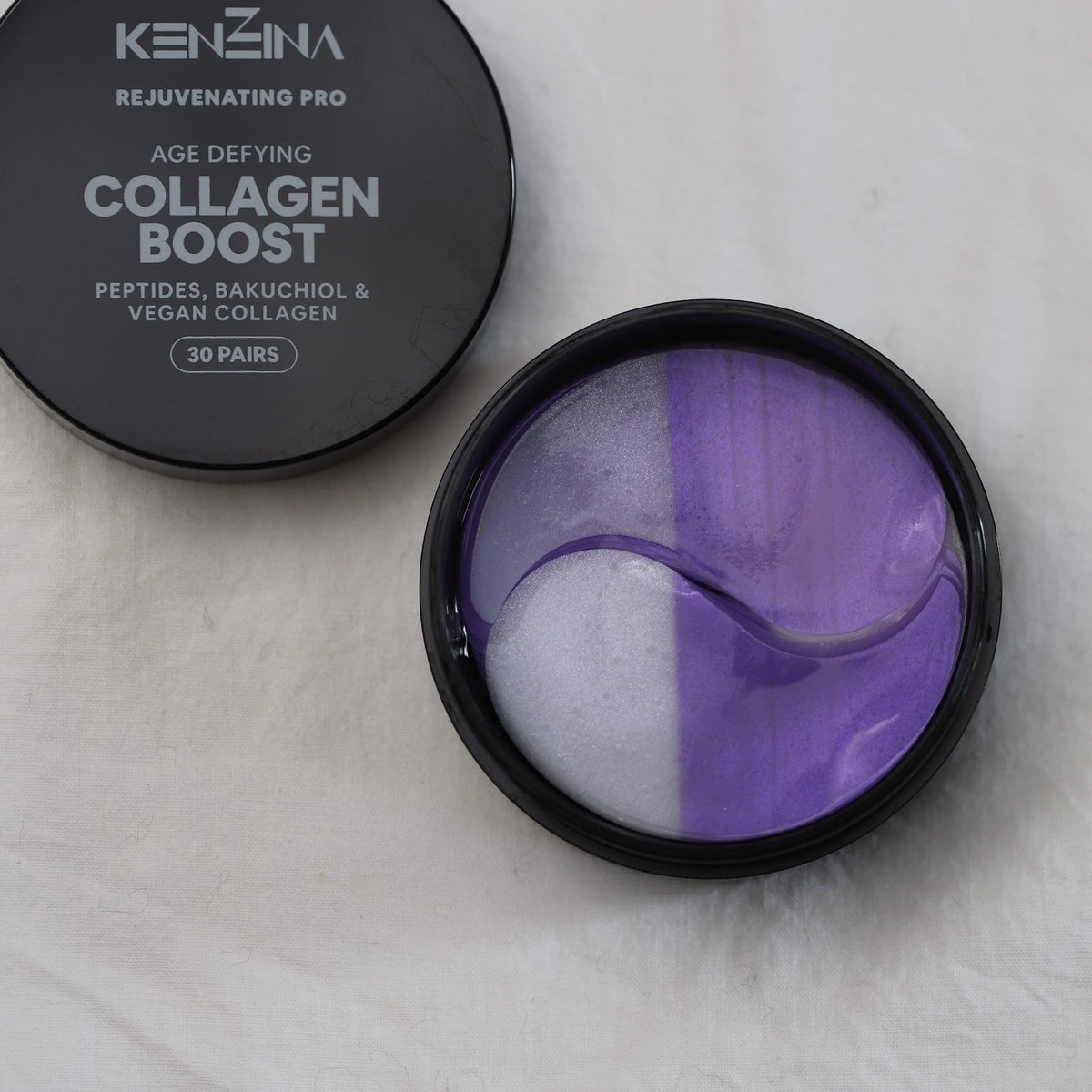 Collagen Boost jar open next to its lid